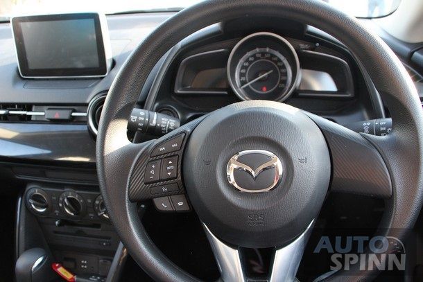 https://img.icarcdn.com/autospinn/body/2015-Mazda2-Skyactiv-EcoCar-Test-Bonanza55.jpg