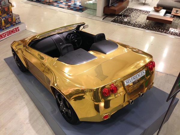 https://img.icarcdn.com/autospinn/body/Gold-plated-electric-car-1.jpg