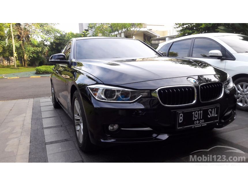 BMW 320i 2015 Sport 2.0 di Banten Automatic Sedan Hitam Rp 