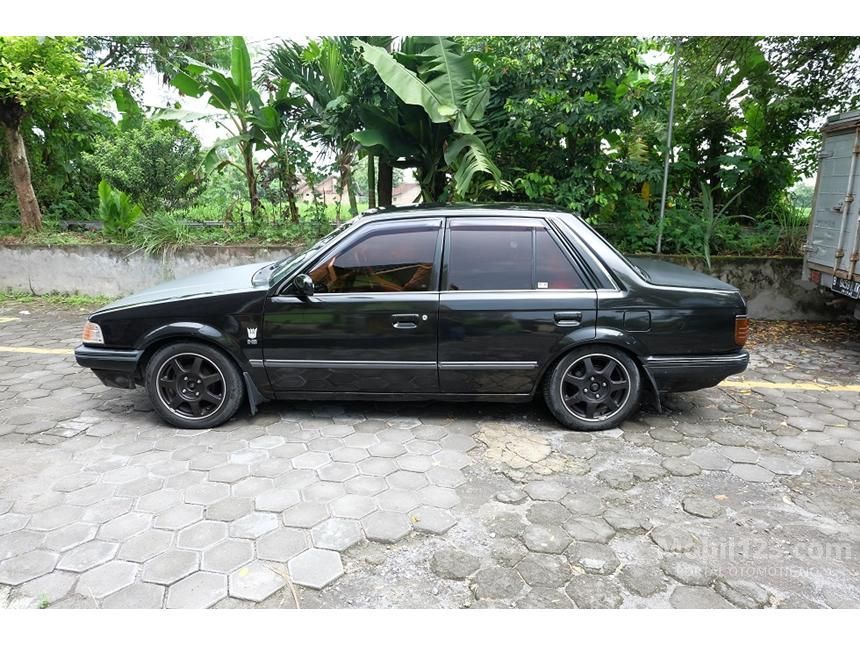 Ford Laser 1998 NA 1.3 di Yogyakarta Manual Sedan Hitam Rp Ford Laser 1998 NA 1.3 di Yogyakarta Manual Sedan Hitam Rp