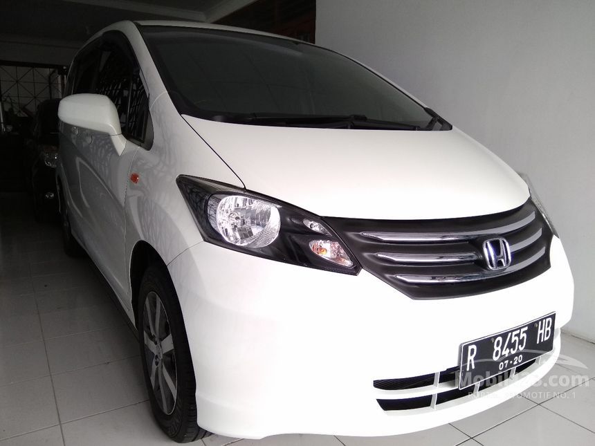 Foto Mobil Freed Putih - Auto-Werkzeuge