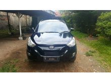 2011 Hyundai Tucson 2.0 GLS SUV warna hitam menarik