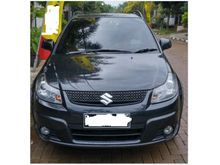 Suzuki SX4 X-Over Automatic 2010 hitam depok, pemakaian 2011