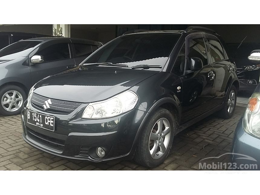 Suzuki X-Over 2009 1.5 di Banten Manual Sedan Hitam Rp 96 