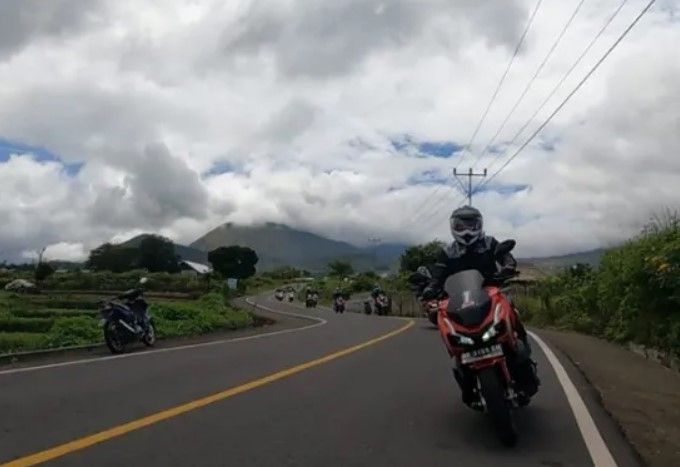 Berkendara sepeda motor Foto: Honda)