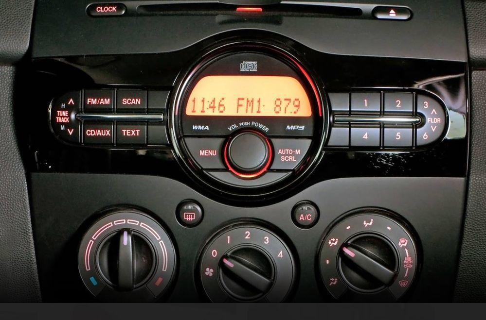 audio mazda 2 bekas 2011